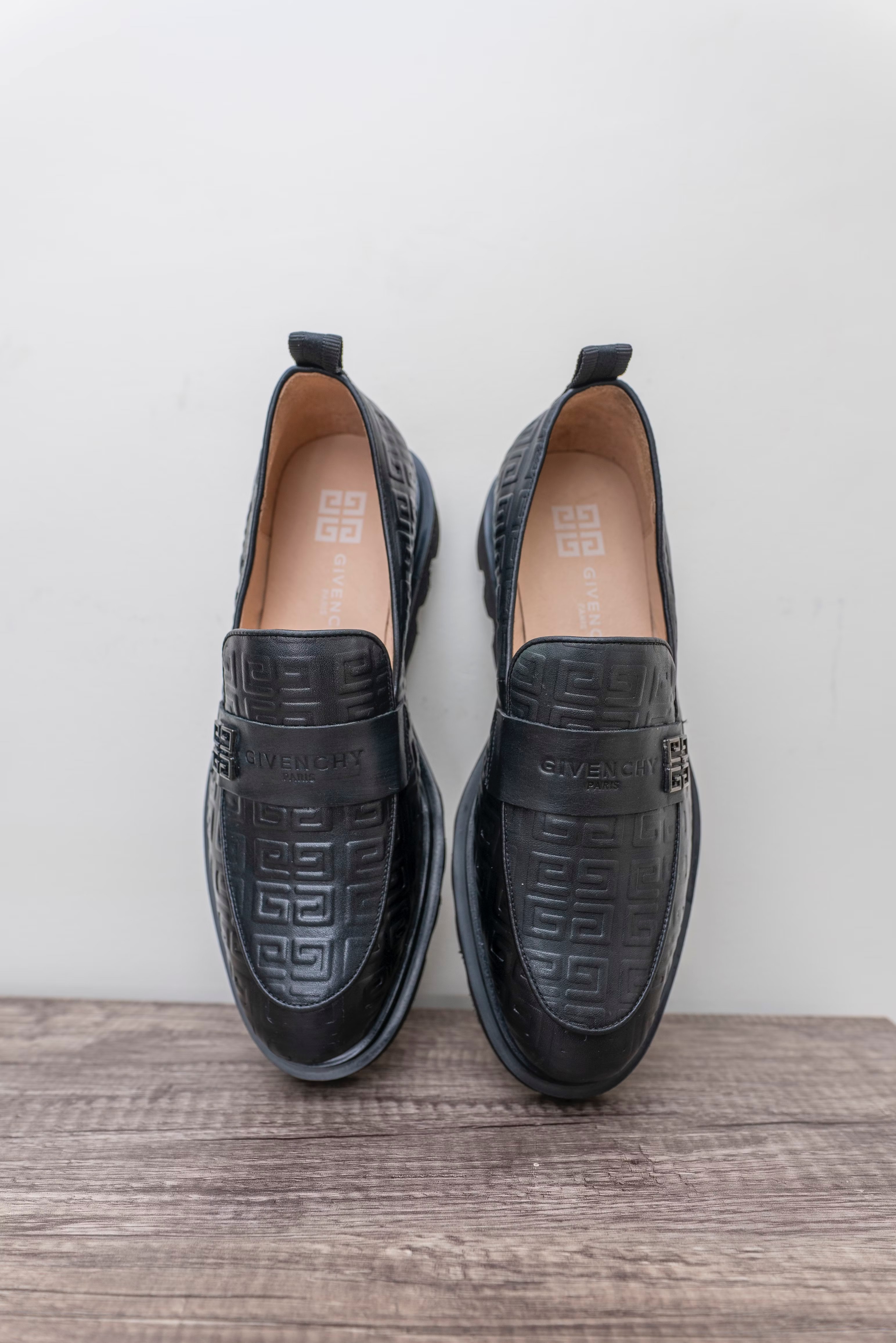 Givenchy black leather loafers with embossed pattern